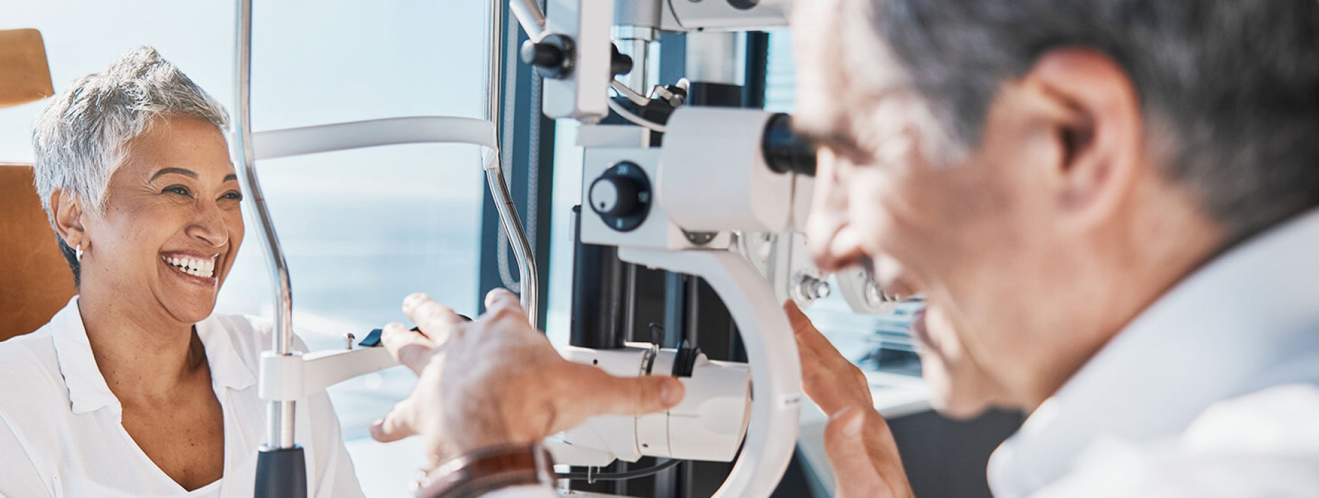 Eye Doctor preparing patient for eye exam